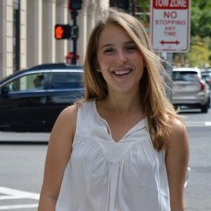 White flowy sleeveless blouse